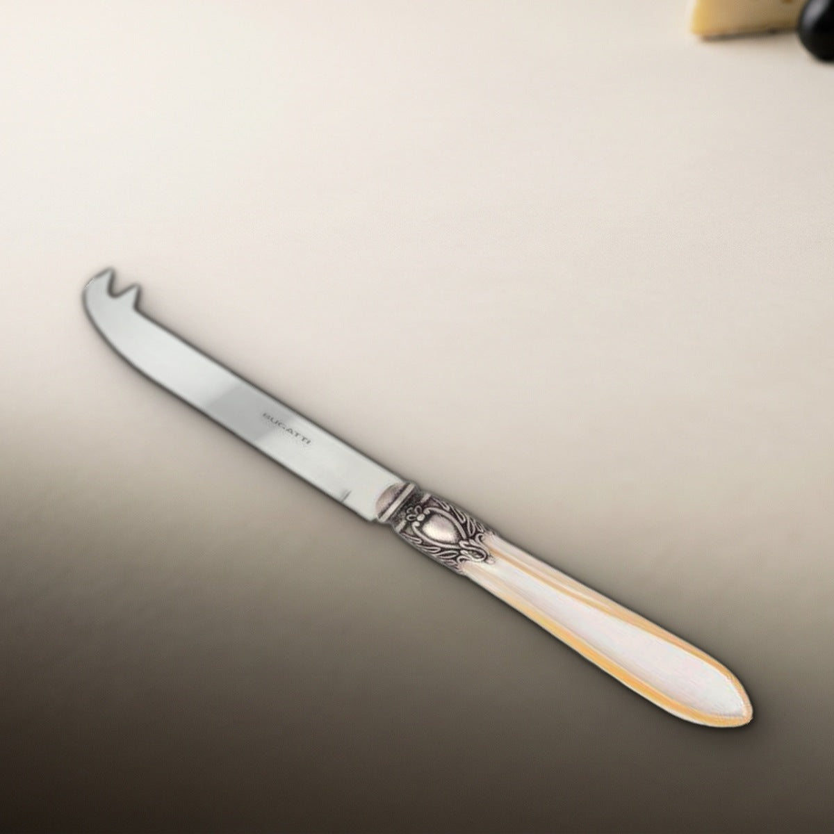 Casa Bugatti Oxford Antique two-point deer cheese knife, studio photograph