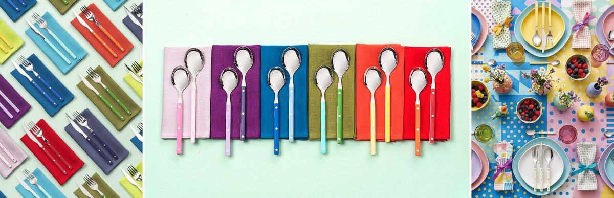 Allegra flatware in every color: place settings on colored napkins, spoons on a row of linen napkins, and a pastel table set with Allegra