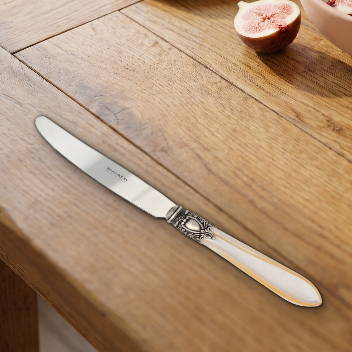 Casa Bugatti Oxford Antique fruit knife on a warm oak table