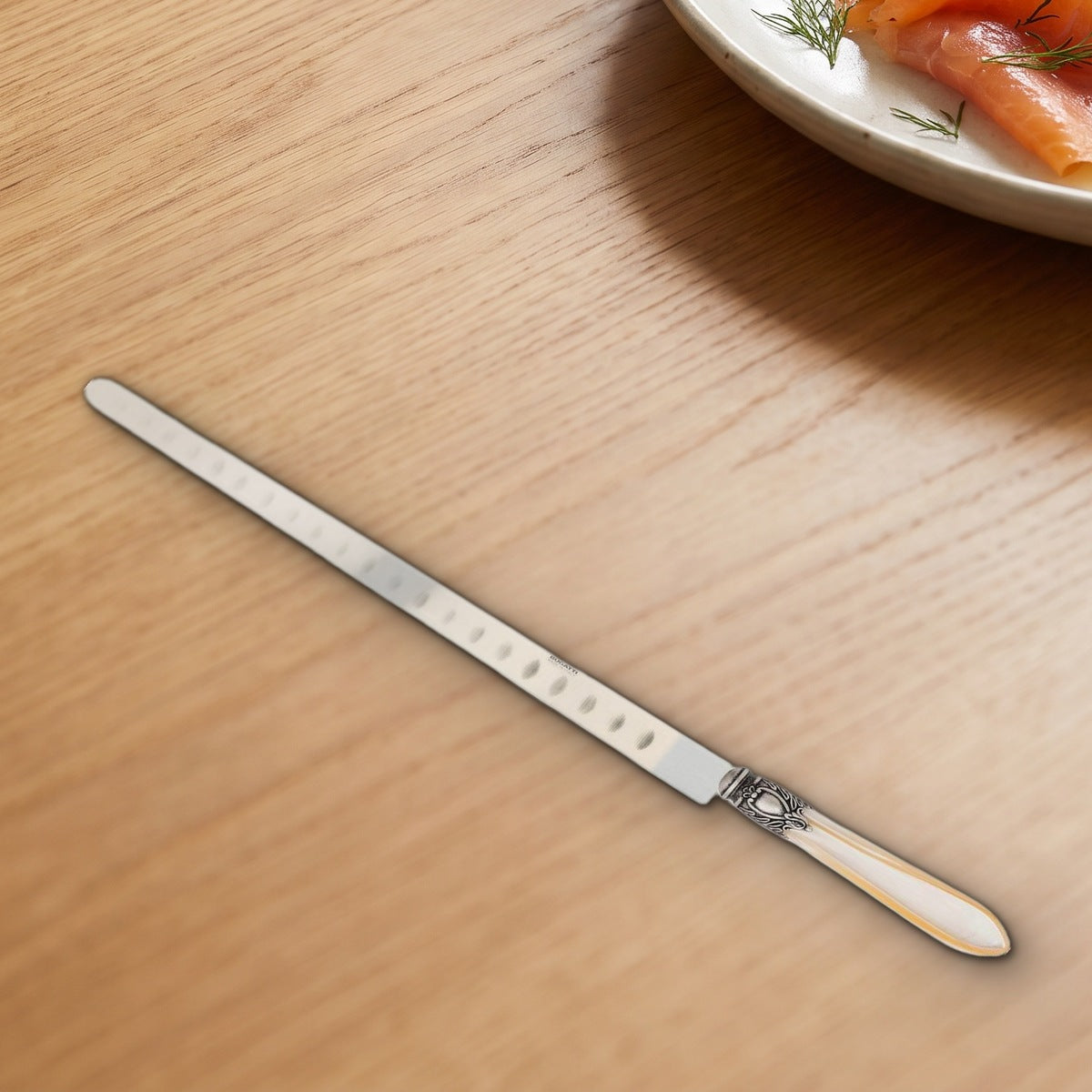 Casa Bugatti Oxford Antique salmon knife on a warm oak table